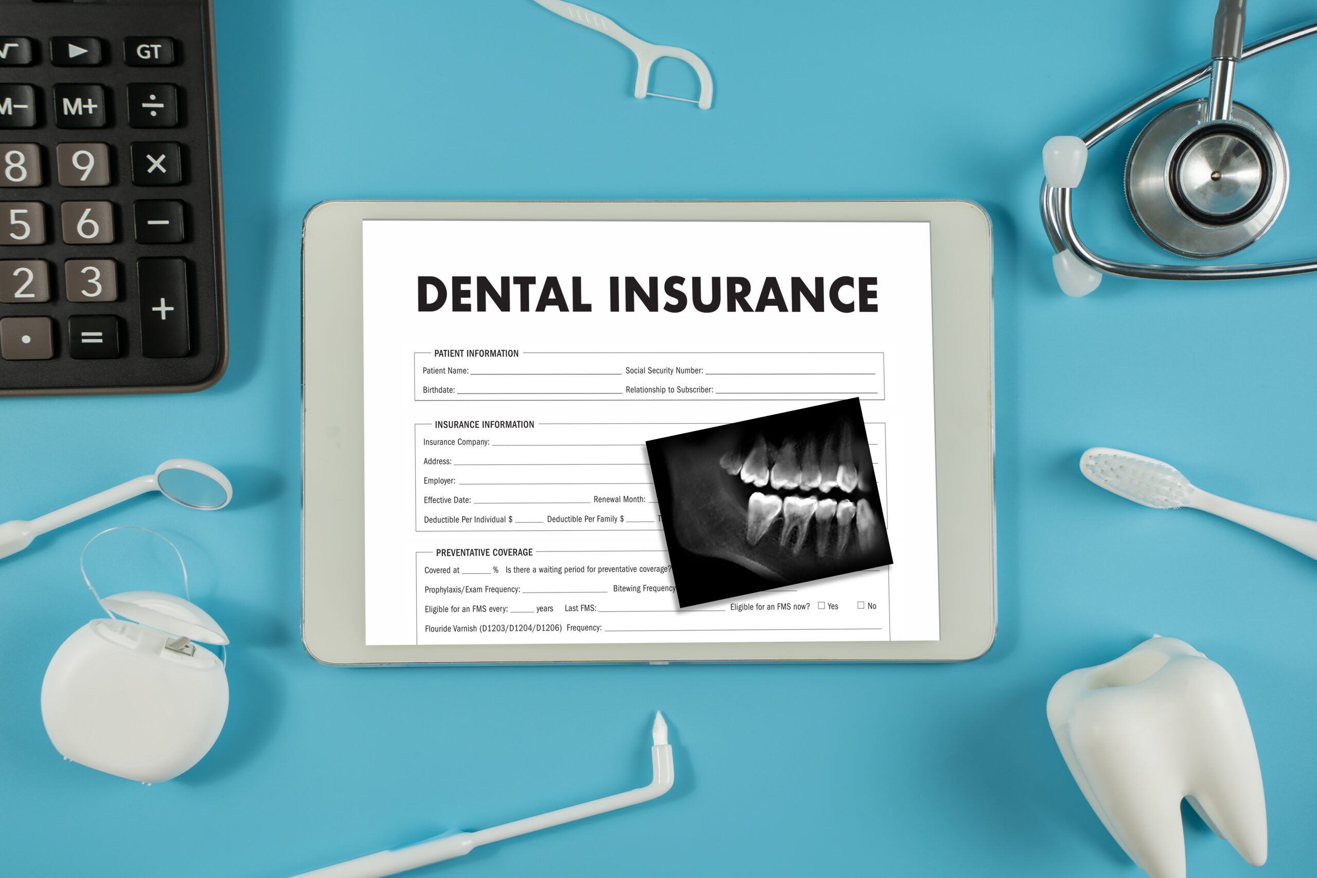 Dental insurance paperwork and tools for reviewing care costs